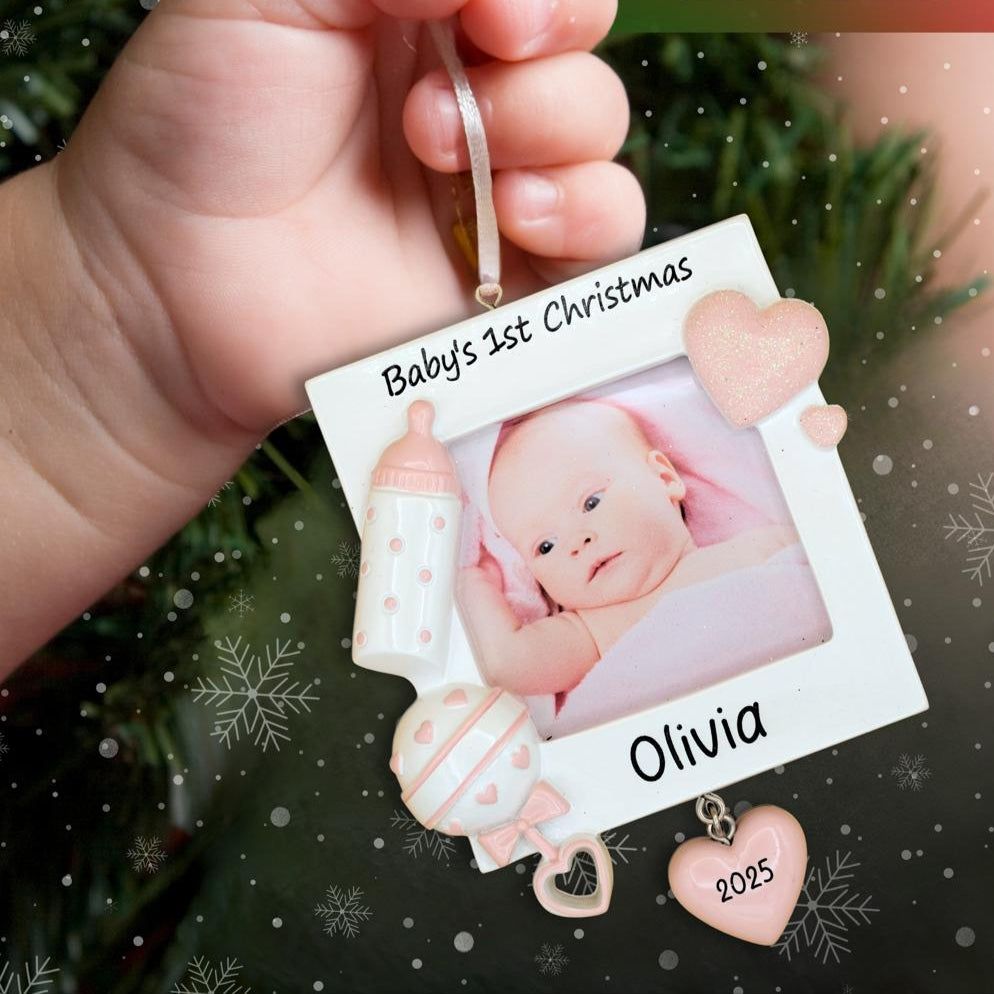 Baby girl picture frame ornament on hand