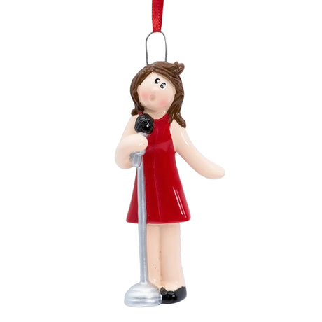 Close‑up of girl holding vintage microphone on custom singing ornament.