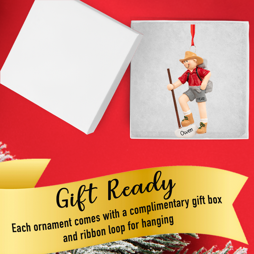 Gift‑ready box displaying Personalized Hiking Boy Christmas Ornament with ribbon