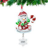 Baby's first Christmas snowbaby ornament, a sweet and memorable decoration to celebrate a special holiday milestone.