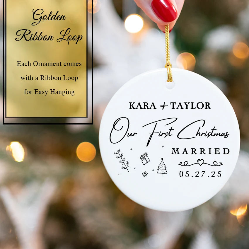 Ceramic married ornament hanging on a Christmas tree branch lit with fairy lights