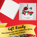 Celebrate your first Christmas together with a snowman lantern couple ornament.