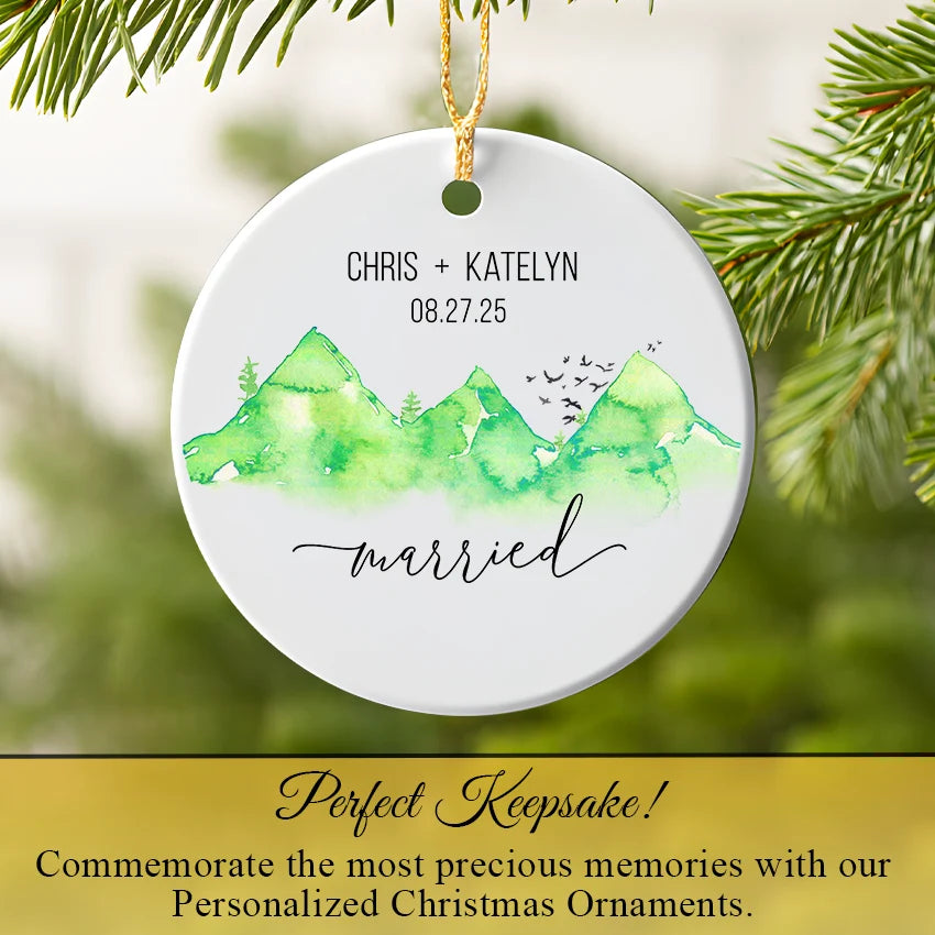 Ceramic wedding keepsake hanging on a tree with pine needle backdrop