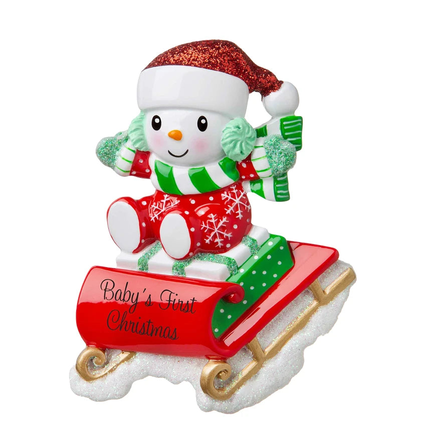Personalized snowbaby on sled ornament, perfect for commemorating a special first Christmas memory.