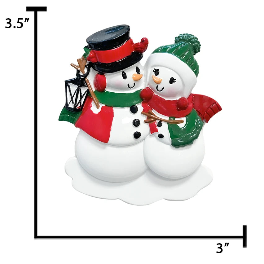 Celebrate your first Christmas together with a personalized snowman couple ornament.