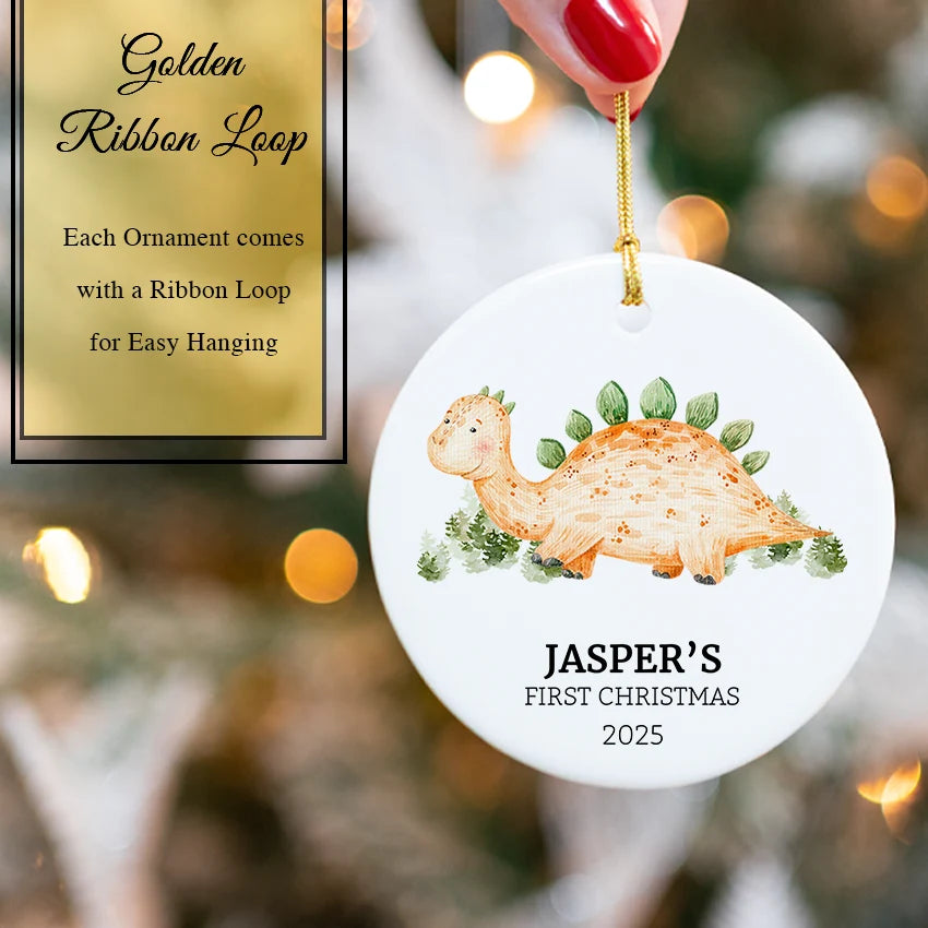 Baby Dino ornament nestled in a keepsake gift box with gold ribbon