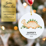 Baby Dino ornament nestled in a keepsake gift box with gold ribbon
